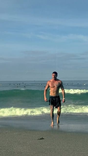 Jasper walking out of the sea